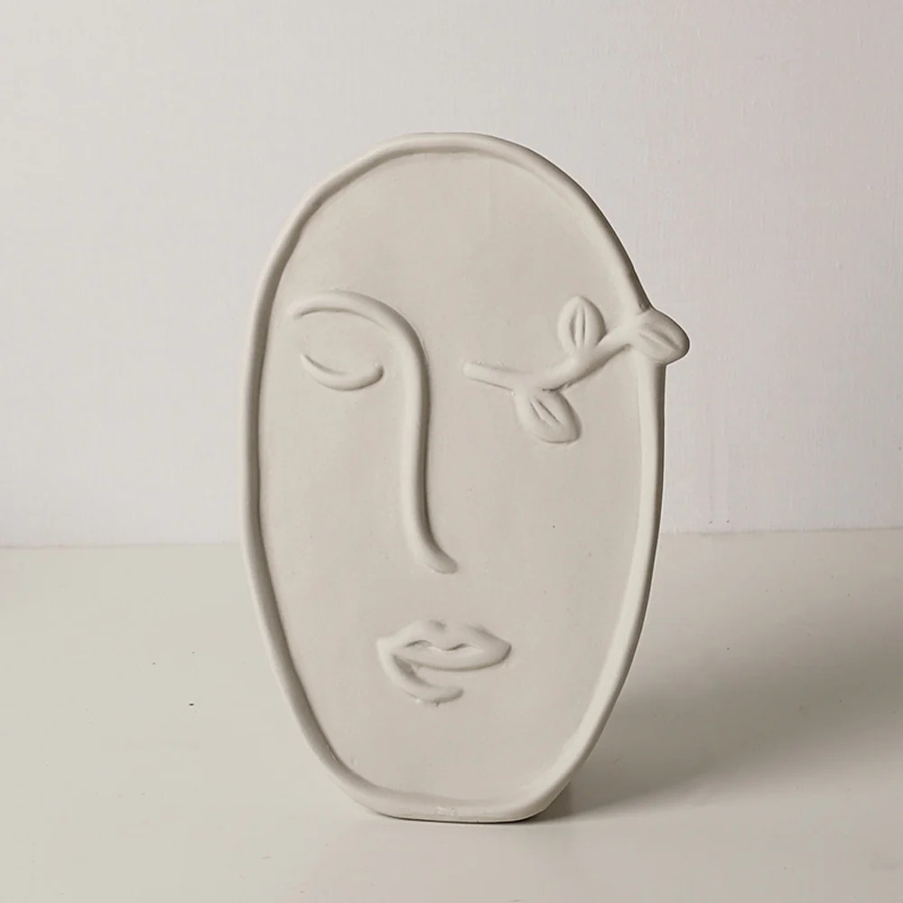 Beige ceramic abstract portrait vase