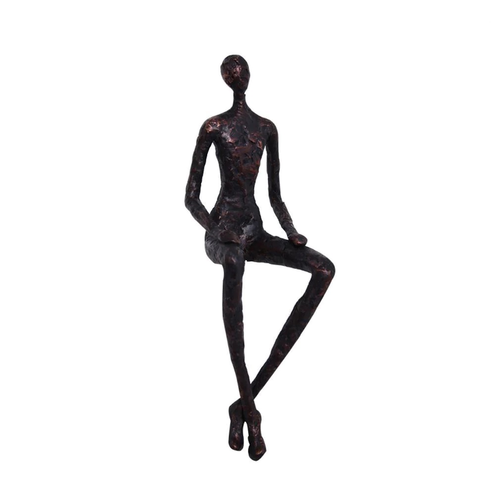 Black resin seated man sculpture
