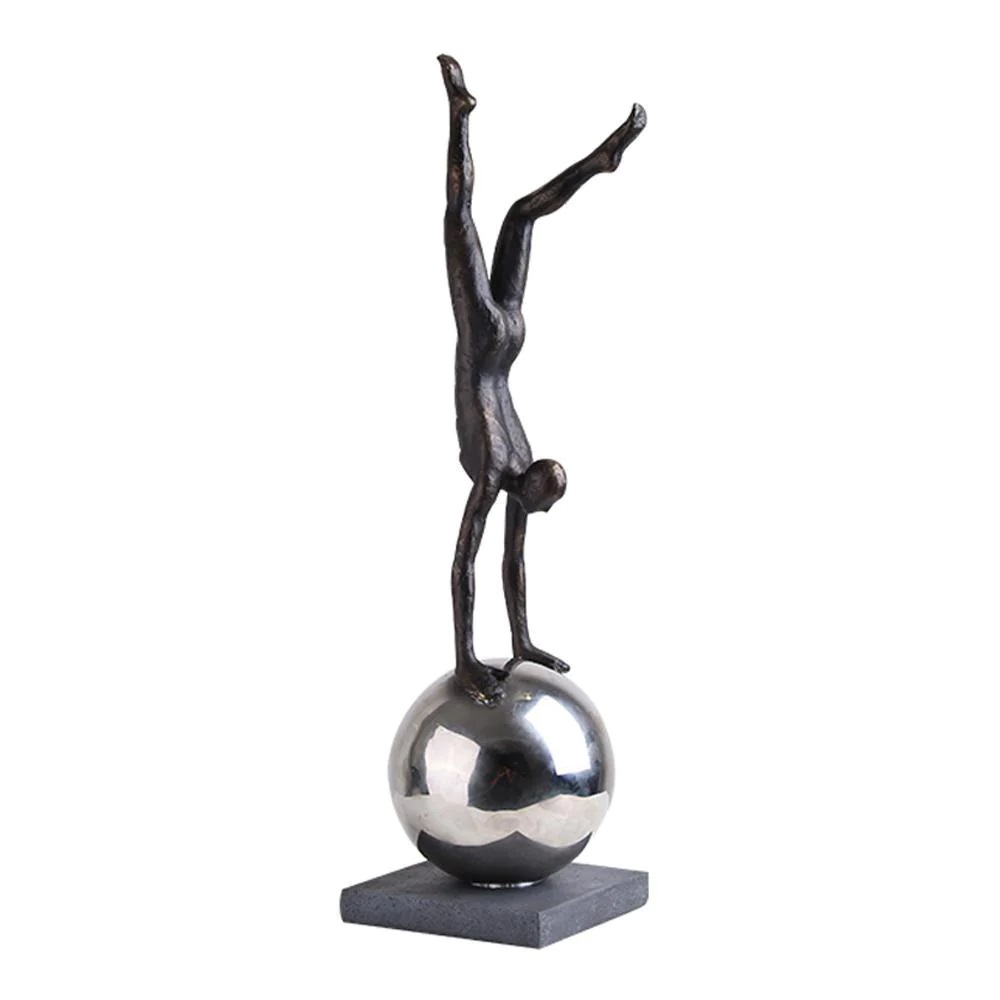 Resin figurative sculpture on metal ball